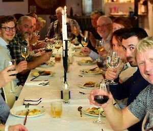 Group photo of expeditioners enjoying wine tasting