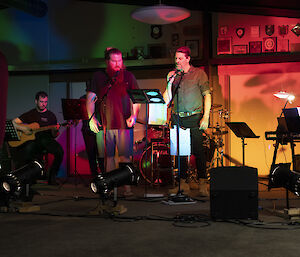 the station band performing some songs on karaoke night