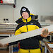 A scientist holds an ice core.