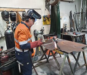 Boiler maker at work in the mechanical workshop