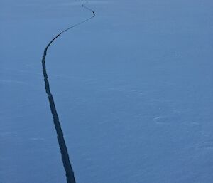 a meandering crack of sea ice