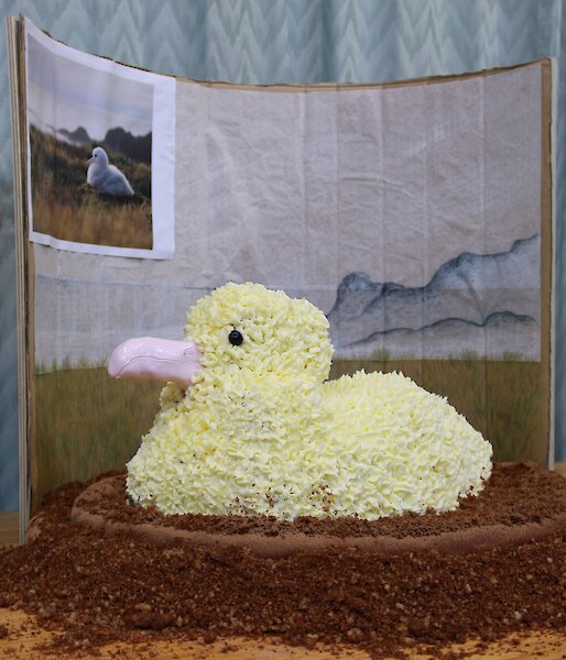 a cake made to resemble an albatross on a nest