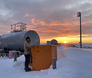 An expeditioner checking out the refueling equipment