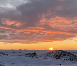 Sunset lighting up a cloud strewn sky