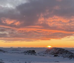 Sunset lighting up a cloud strewn sky