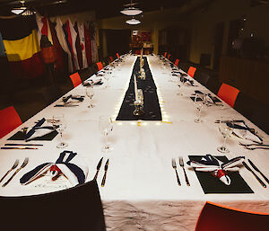 Dinner table at Davis set with silverware.