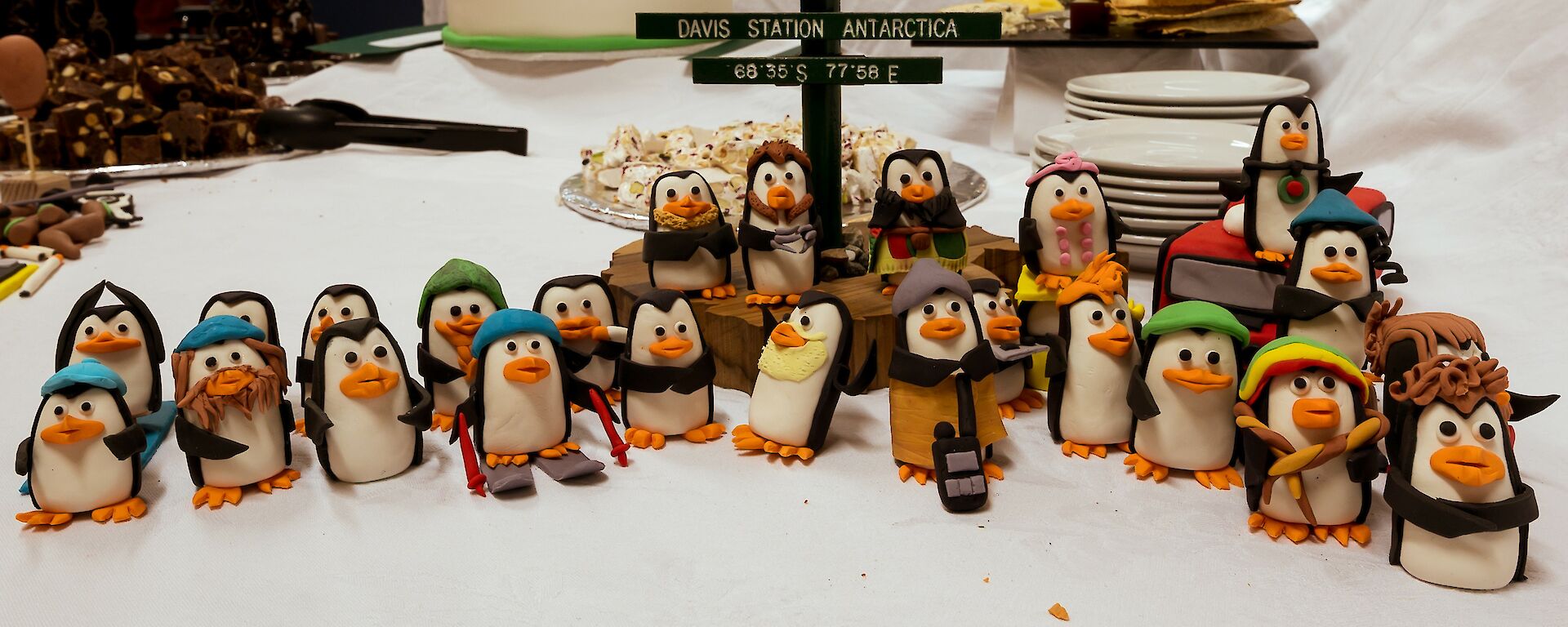 Penguin figurines for each Davis expeditioner on the dining table at station.