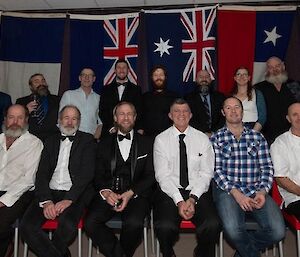 Group photo of expeditioners wearing formal clothes