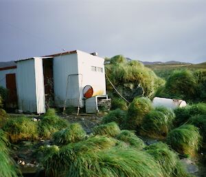 Field hut with water tank installed next to it