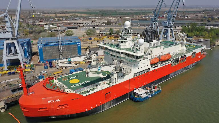 RSV Nuyina alongside the wharf in Romania.