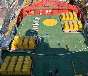 Four groups of weights arranged on the deck of the ship.