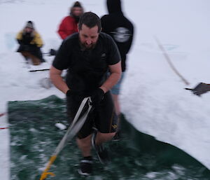 Glenn Harradine making a fast exit from the Midwinter swim pool at Casey recently