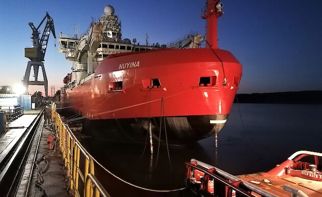 Icebreaker at dock in dawn light