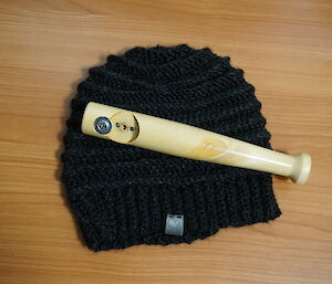 A locally knitted beanie and bottle opener made for an expeditioners birthday at Casey