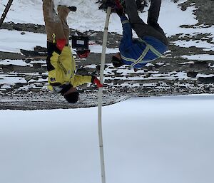 Two expeditioners undertaking fieldwork