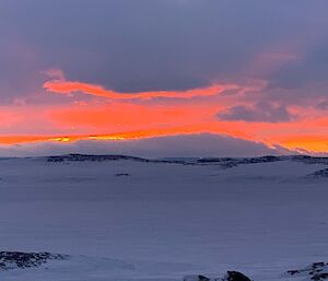 A cloudy Casey sunset with fiery colours