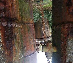 Several large old rusty cookers