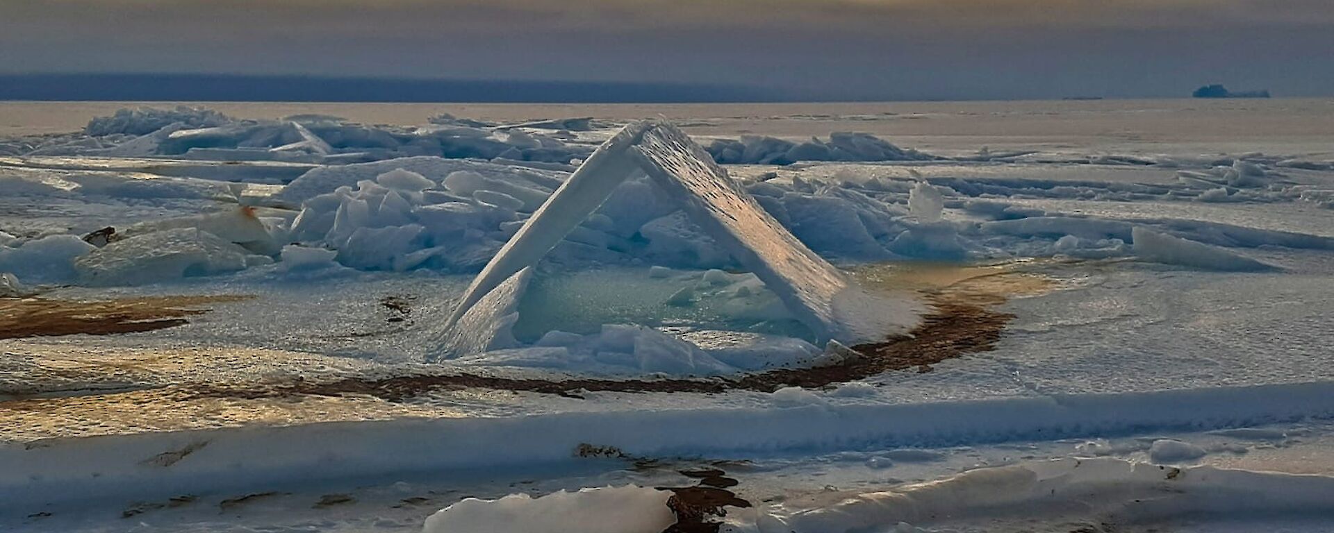 Sea ice formation of ice pushed together like the roof of a house