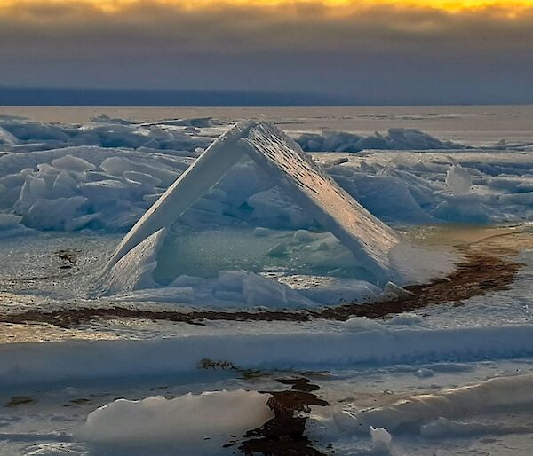 Sea ice formation of ice pushed together like the roof of a house