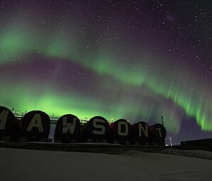 Aurora Australis over Mawson station tanks