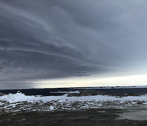 A front approaches over Newcomb Bay near Casey