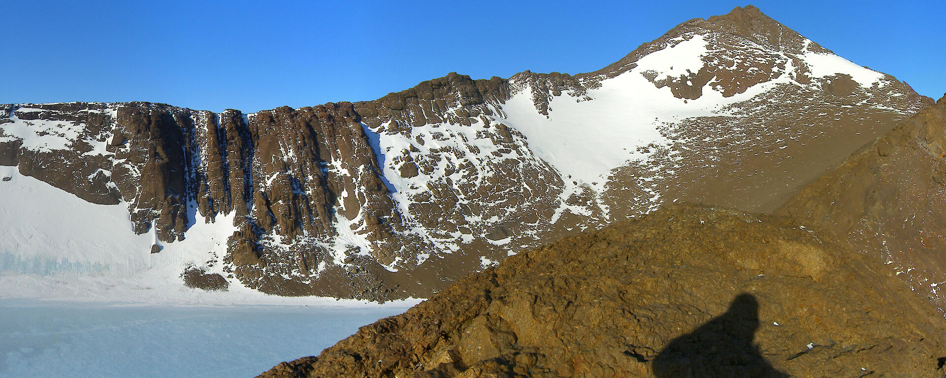 A panoramic aerial shot of Lake Henderson from the mountain above