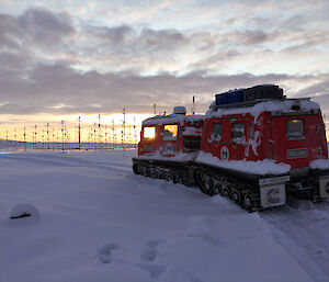 A Hagglund in the foreground with a Metosphere-Stratosphere-Troposphere radar behind