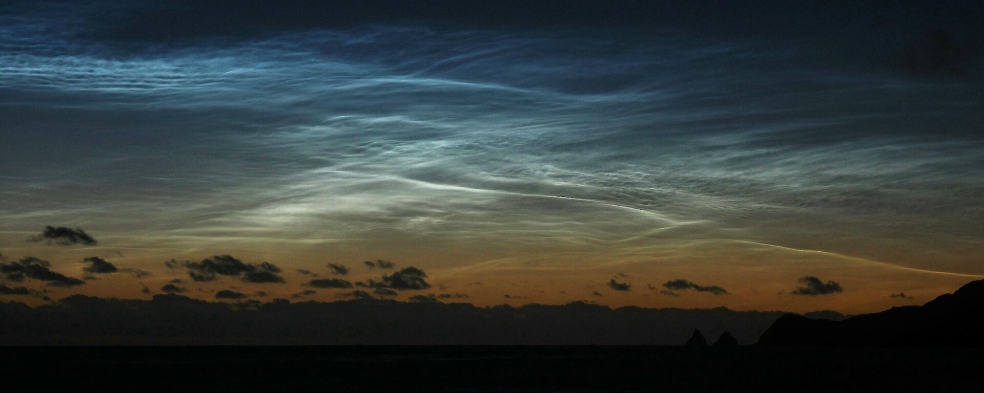 Bright noctilucent cloud and a dark sky