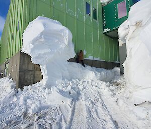 A man digging snow