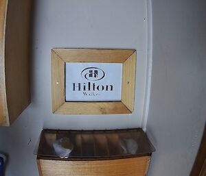 The sign at Wilkes hut proclaiming it the Wilkes Hilton