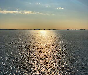 Frozen ice to the horizon, lit by the sun