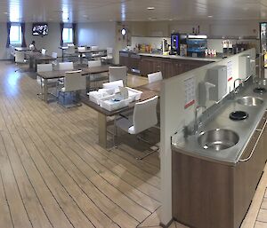 Sinks and tables in the mess area of the Nuyina.