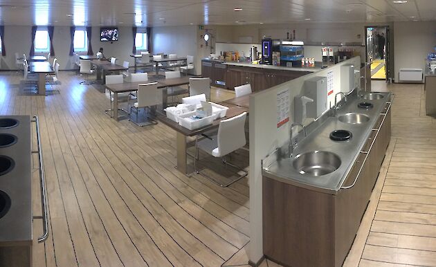 Sinks and tables in the mess area of the Nuyina.