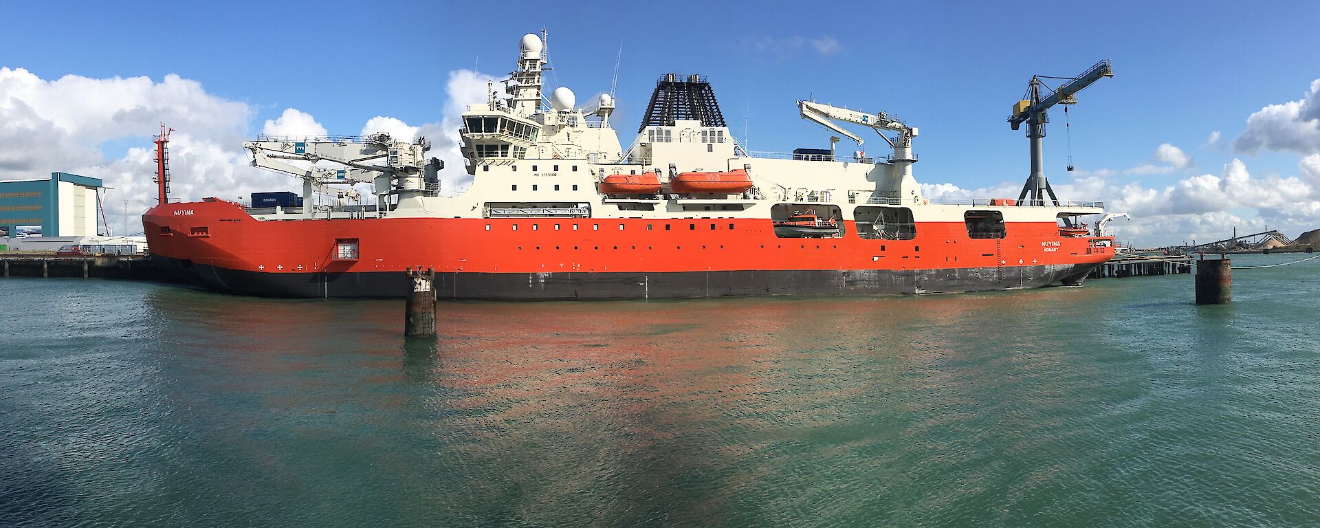 The port side length of the ship tied up at a wharf in the Netherlands.