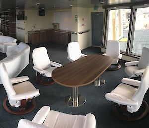 Tables and chairs in the science observation area of the Nuyina.