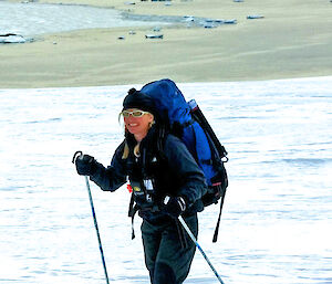 Expeditioner skiing on plateau