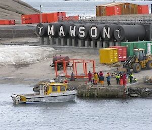 Sleep-deprived boat people await repatriation to the Aurora