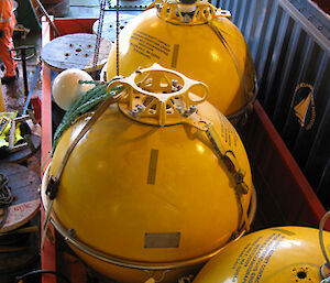 Some of the large yellow buoys that sit at the top of the moorings. The one at the far end has an ADCP attached (blue and red instrument) to measure the ocean profile between the surface and 500m below.