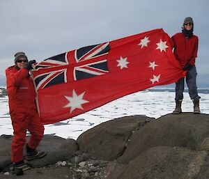 Sandra Potter and Wendy with the flag from the cache at Walkabout Rocks