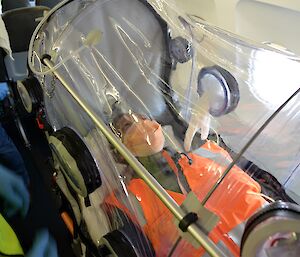 woman inside isolation chamber