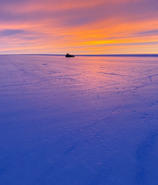Proof-rolling machinery sits on the Wilkins runway at dawn