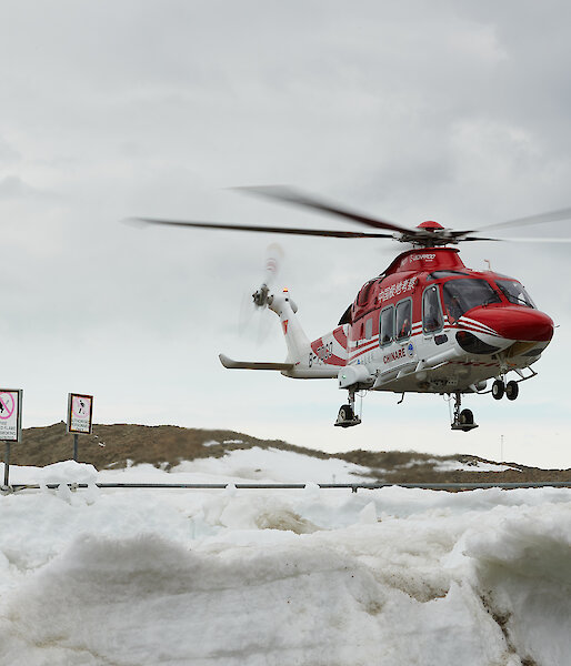 helicopter takes off