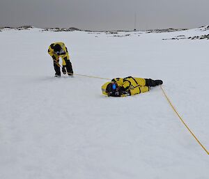 Practice searching for a fallen expeditioner using a rope.