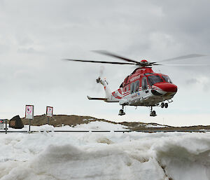 helicopter landing on snow