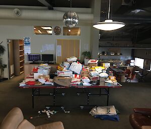 A large pile of mail on a table