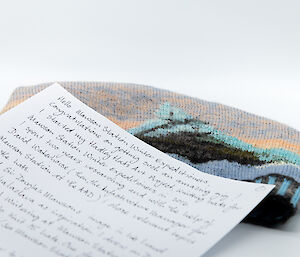 beanie and letter