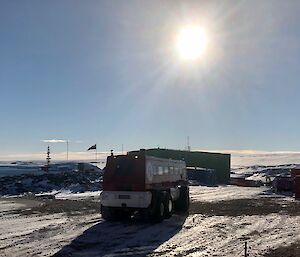 A terrabus sits in the snow on station