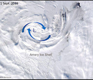 Satellite image showing swirling clouds of a cyclone