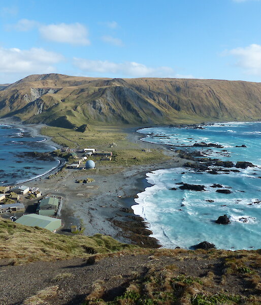 View of Macquarie Island station and the isthmus from a hill.
