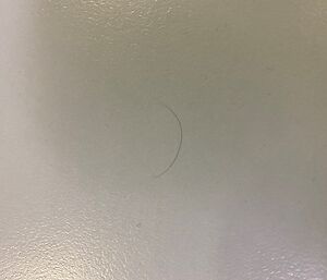 A close up of a hair that has been left on a table